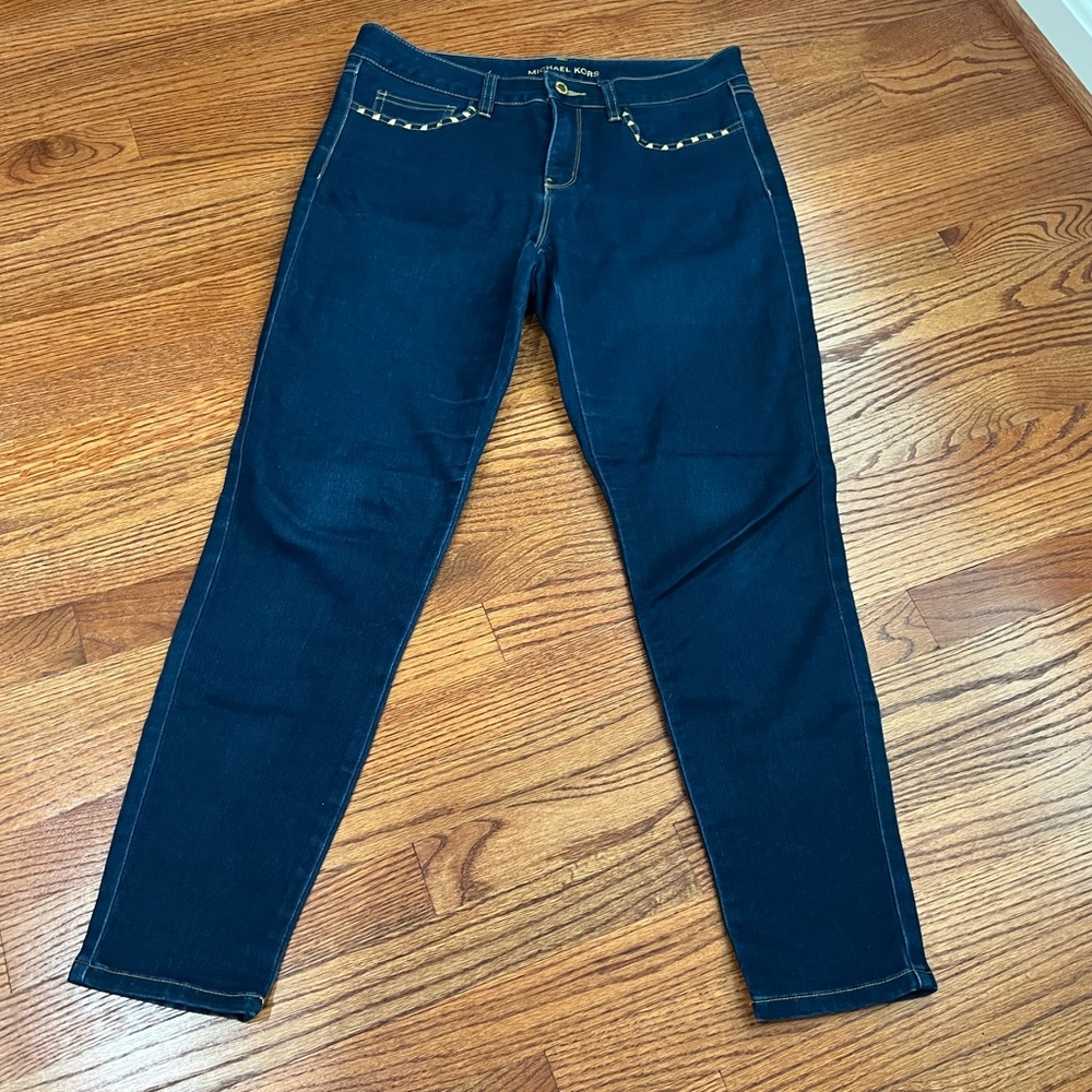 Michael Kors gold studded jeans. Ankle length in dark wash